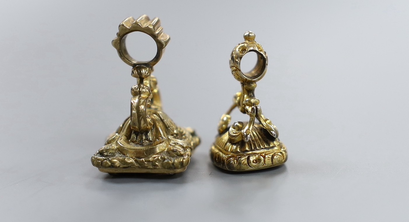 Two Victorian yellow metal overlaid and quartz set fob seals, (1 a.f.), largest 24mm.